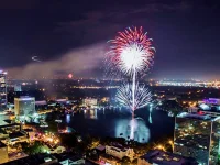 4th of July events and fireworks in Orlando: image of fireworks bursting over Lake Eola on 4th of July