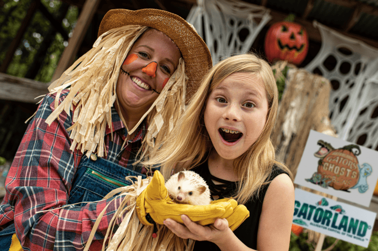 Halloween Orlando: Gatorland’s Gators, Ghosts And Goblins: image of girl holding a porcupine at Gatorland