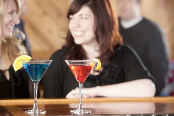 Happy hour deals Orlando: image of two women with happy hour martinis