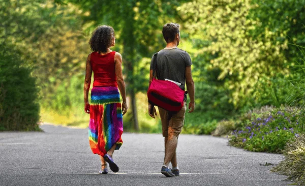 Where to walk Orlando: image of a couple walking on a shaded trail