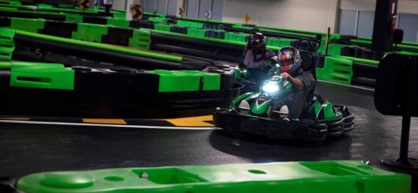 Andretti Indoor Karting & Games: image of person driving kart indoors at Andretti