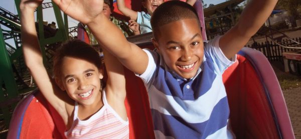 Free things to do in Orlando online: image of kids riding a roller coaster