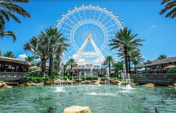 The Wheel discounts: image of the Wheel and fountains at ICON Park in Orlando