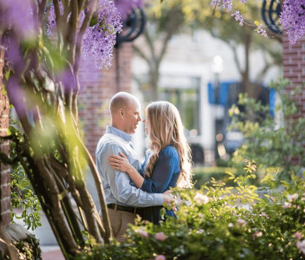 Date night ideas in Winter Garden: image of a couple hugging in historic downtown Winter Garden near Orlando