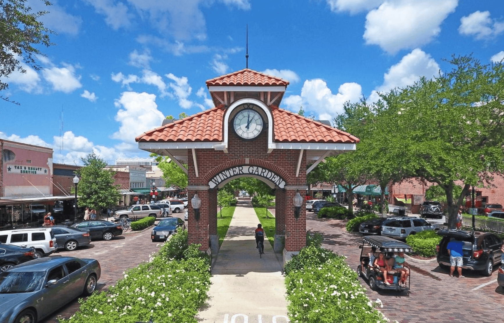 Date night ideas: image of downtown entrance with bike trails and brick lined streets in downtown Winter Garden