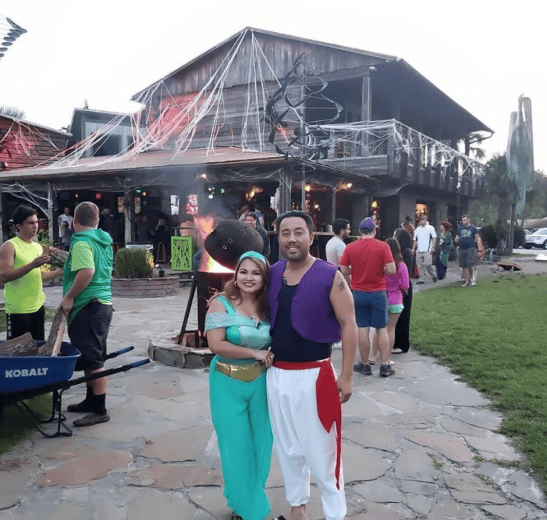 Halloween events Orlando: image of a couple dressed in a Halloween costume at Wekiva Island in Longwood near Orlando during their annual Halloween costume contest evetn