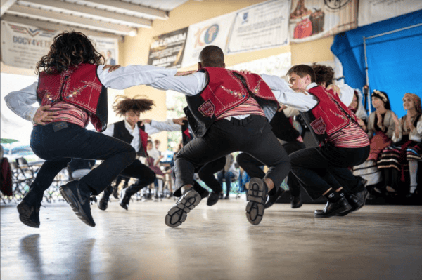 Things to do Orlando: image of people dancing at Orlando Greek Fest