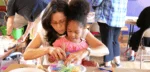 Things to do Orlando: image of a mom and daughter make a free craft at the Mennello Museum of Art in downtown Orlando