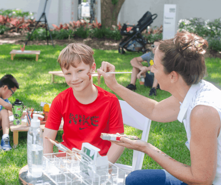 Face painting at the Free Fall Family Day at the Art & History Museums of Maitland